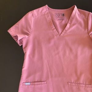 Mauve two pocket FIGS scrub top